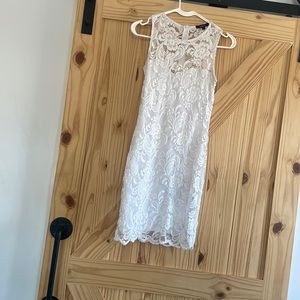 Short right white dress, size small and is ambiance brand